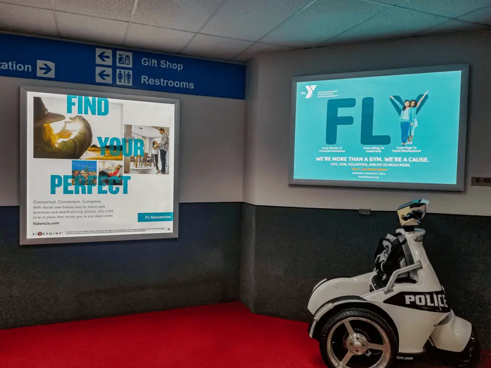Airport diorama advertising in a gate holdroom.